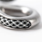 Detalj av sömnad och märkning på DMM Tryggr Thimble